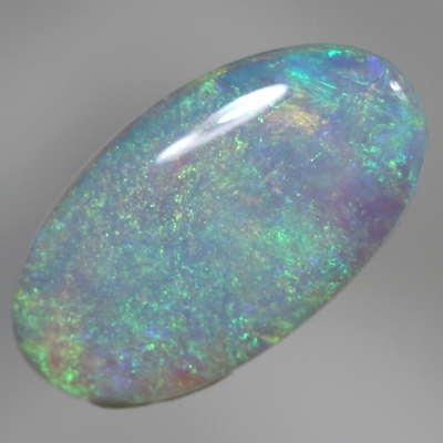 SOLID CRYSTAL OPAL Bright green fire plays in a 3D pattern throughout the opal